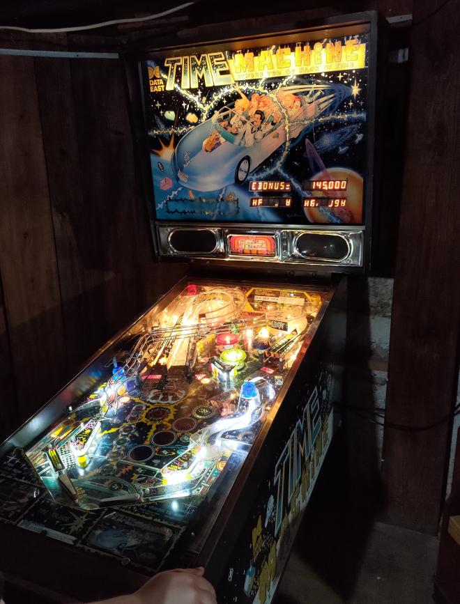 My Time Machine set up in the corner of our basement. The lights are off to better showcase the warm,
incandescent glow coming from the machine.